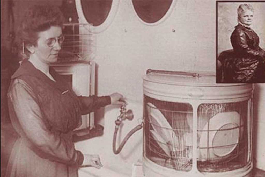An old photograph of a woman operating the first automatic dishwasher, which was invented by a woman.